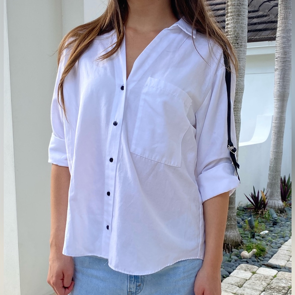 Zara white button down shirt size XS with blue stripe tie up sleeves.